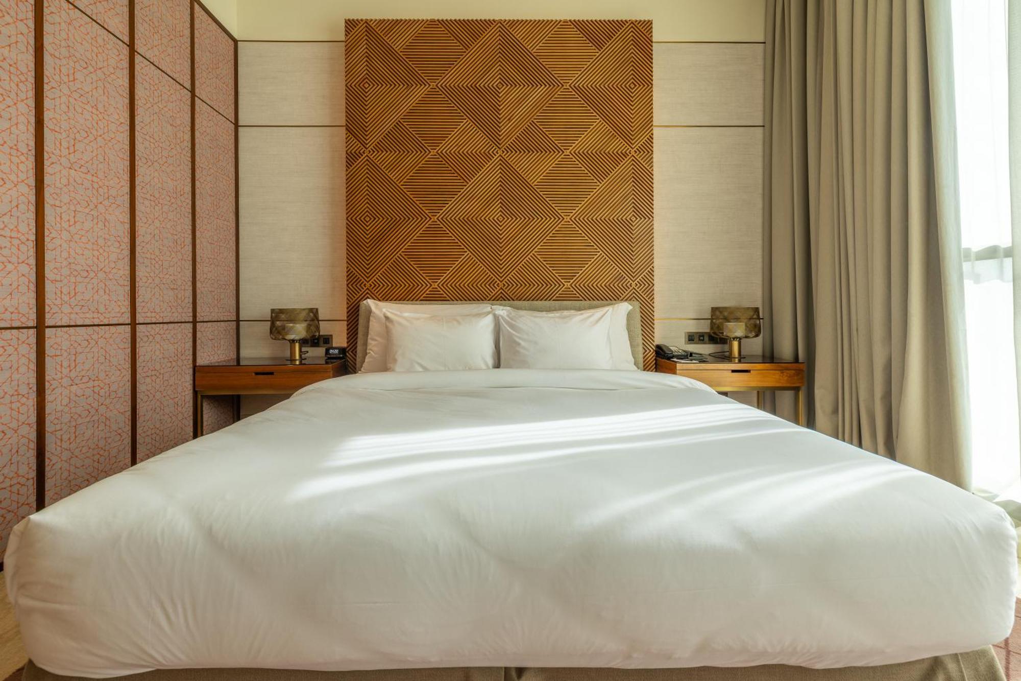 Shirvan Hotel City Yard Djedda Buitenkant foto A bed